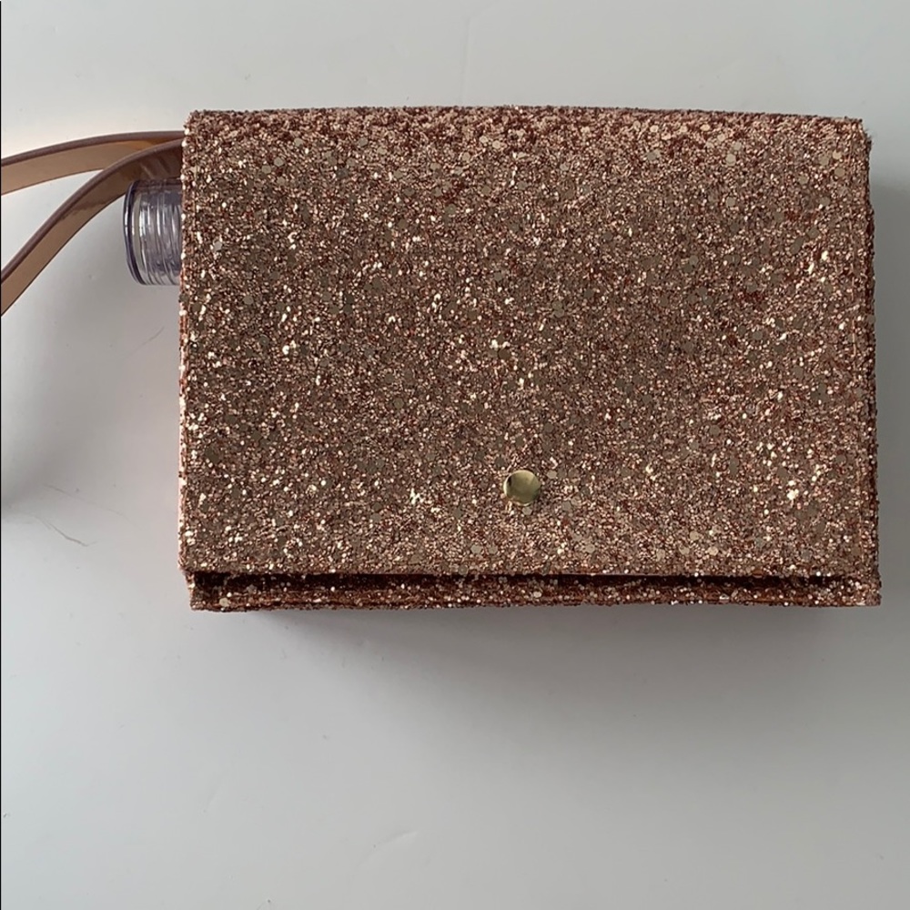 Slant sparkly rose gold flask clutch NWT